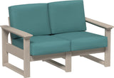 This image shows the deep seating loveseat on a white background. The frames are weatherwood and the cushions are cast breeze.