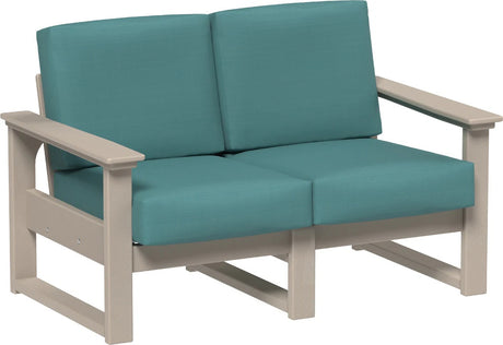 This image shows the deep seating loveseat on a white background. The frames are weatherwood and the cushions are cast breeze.