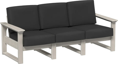 This image shows the deep seating sofa on a white background. The frames are birch and the cushions are spectrum carbon.