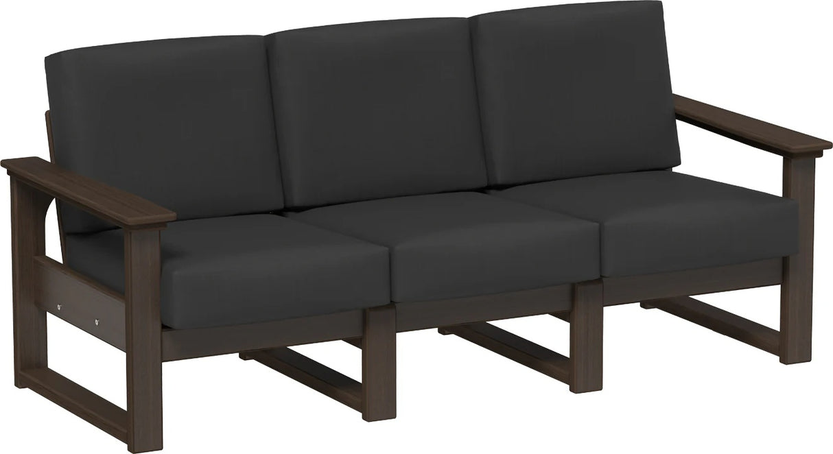This image shows the deep seating sofa on a white background. The frames are Brazilian walnut and the cushions are spectrum carbon.