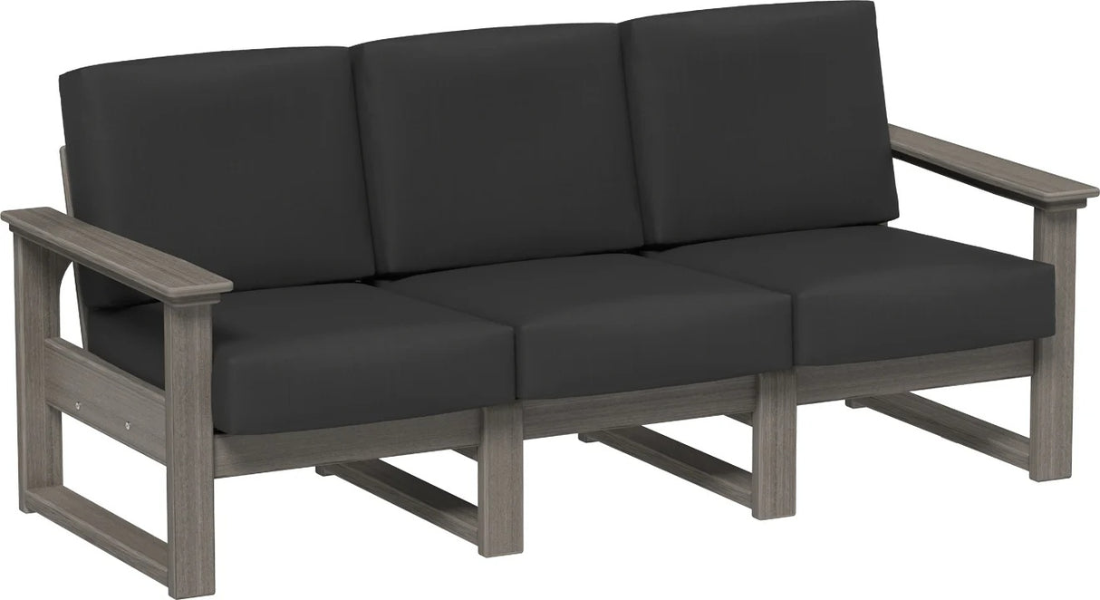 This image shows the deep seating sofa on a white background. The frames are coastal gray and the cushions are spectrum carbon.