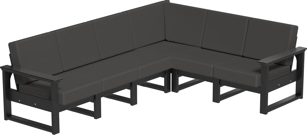 This image shows the deep seating sectional on a white background. The frames are black and the cushions are spectrum carbon.