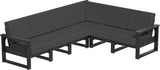 This image shows the deep seating sectional on a white background. The frames are black and the cushions are spectrum carbon.