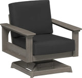 This image shows the deep seating swivel rocker chair on a white background. The frames are coastal gray and the cushions are spectrum carbon.