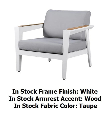 This image shows the club chair on a white background. It reads "In stock frame finish: White. In stock armrest accent: Wood. In stock fabric color: Taupe."
