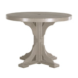 This is the Weatherwood colored round dining table on a white background.