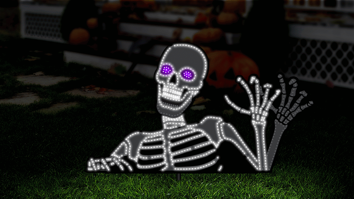This is an animated image showing the skeleton decoration in motion. He appears to wave, his mouth opens and his eyes go from purple to black.