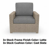 This image shows what the lounge chair looks like on a white background. The photo reads "In stock frame finish color: Latte. In stock cushion color: Cast Slate."
