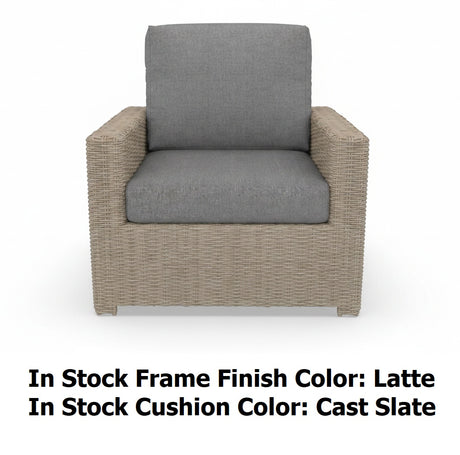 This image shows what the lounge chair looks like on a white background. The photo reads "In stock frame finish color: Latte. In stock cushion color: Cast Slate."