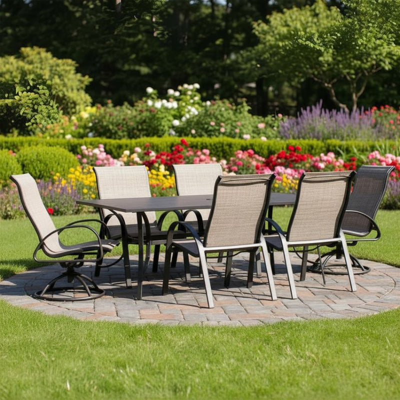 Outdoor patio table with six chairs in a garden setting