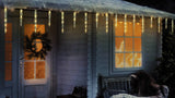 Set of 20 twinkling LED icicle lights. One set is pure white and blue. One set is warm white.