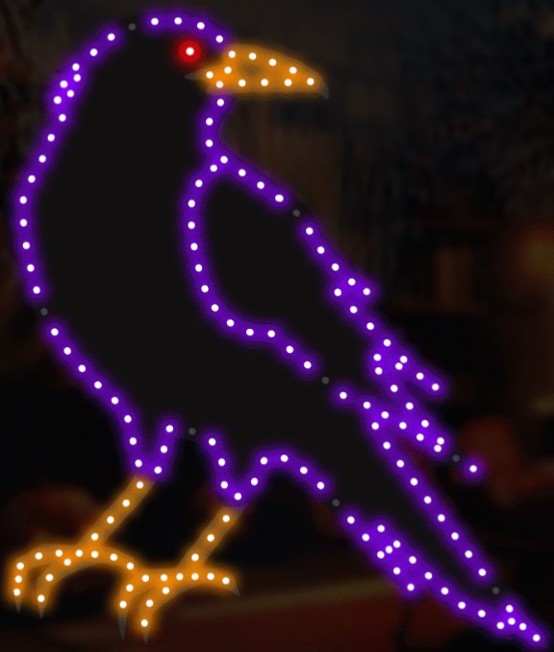 This image shows what this Halloween decoration looks like. It's a purple raven with a yellow beak and yellow claws. The raven has one red eye.