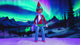 This video showcases a Scout Elf wearing the helmet, goggles and blue magic standing pants. He's holding the snowboard and the aurora borealis is in the background.