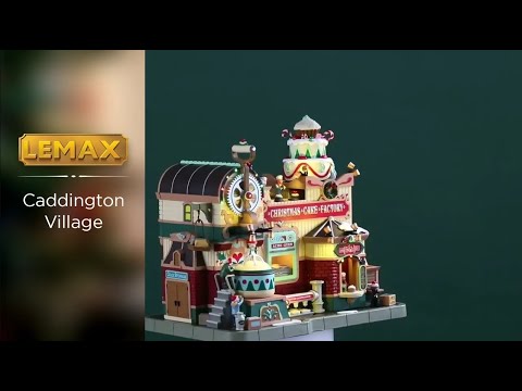 Resin lighted building for a Lemax display. Designed to look like an animated cake factory. A detailed, whimsical model of a "Christmas Cake Factory" with bright lights and animated figures depicting various festive baking activities. This resin lighted building captures the holiday spirit beautifully.