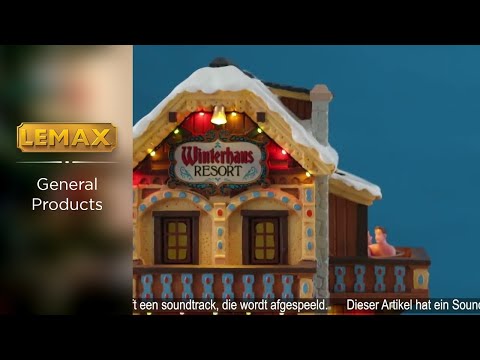 Animated, polyresin lighted building for a Lemax display. Designed to look like a rustic hotel on top of a snowy mountain. There's a person building a snowman, there's a person skiing and a person snowboarding. At the bottom of the mountain there's a person walking through an entrance to a Ski Lift.