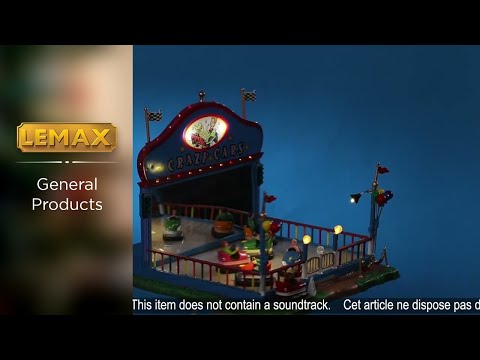 Village accent for a Lemax display. Designed to look like a bumper car carnival ride. There are multi-colored balloons and flags and people riding in the cars.