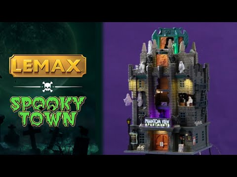 Resin lighted building for a Lemax display. Designed to look like a tall stone apartment building. There are ghosts everywhere and skulls. Parts of the building are missing so you can see ghosts inside their homes.