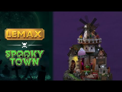 Resin building for a Lemax display. Designed to look like a creepy cabin connected to windmill and a water wheel. There are tombstones and bone accents.