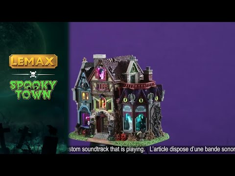 This is a video showing the Lemax Spooky Town lighted building that's designed to look like a slightly dilapidated and very colorful mansion. Some of the accents include: skulls, jack-o-lanterns, owl statues and dead plants. There are ghosts, monsters and skeletons visible in the windows. 
