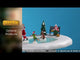 Village accent for a Lemax display. Designed to look like a frozen pond surrounded by snow. There's a child skating on the ice with Santa and a reindeer. Mrs. Claus is sitting on a bench watching.
