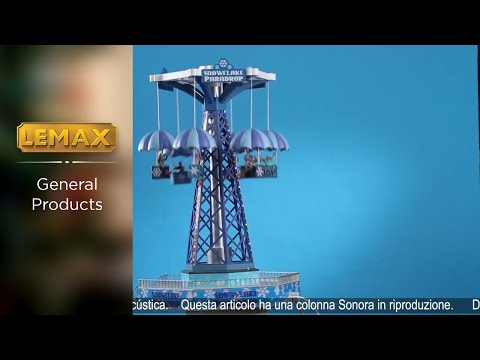 Village accent for a Lemax Carnival display. Designed to look like a snowflake themed carnival ride. The carts go in the air and fly around.
