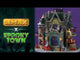 Resin lighted building for a Lemax display. Designed to look like a gothic castle. There are skeletons and skull accents, as well as gargoyles, pumpkins and rats. Inside the window you can see a skeleton testing out a coffin. Over to the right, there's a bar with a skeleton ready to serve you.