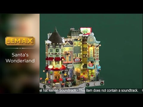 Resin building facade for a Lemax display. Designed to look like a bunch of store fronts. Signs read: "Fay's Flowers & Bouquets," "The Burger Cafe," "Jolly Toys & Games," "Quilter's Island," Sweet Spot" and "Hot Fresh Coffee at the Christmas Bazaar!" There are flowers everywhere and a billboard on the roof advertising a visit with Santa.