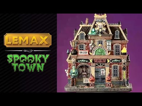 Porcelain building for a Lemax display. Designed to look like a brick museum accented with owls, flames, carved pumpkins, witch hats, ghosts and Frankenstein.