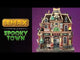 Porcelain building for a Lemax display. Designed to look like a brick museum accented with owls, flames, carved pumpkins, witch hats, ghosts and Frankenstein.