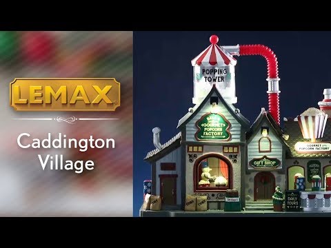Lemax village building designed to look like four homes put together to make one building that makes popcorn.