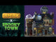 Resin lighted building for a Spooky Town Lemax display. Designed to look like a very large diner. There's a giant, circular sign on the roof that reads "THE FULL MOON DINER" and next to it is a round, yellow moon with a silhouette of a werewolf on it. There's a see through globe with a wolf inside and a werewolf eating inside the diner. There's garbage and bones on the sidewalk.