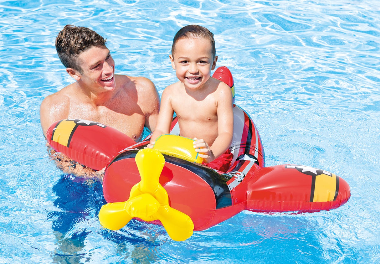 Pool inflatable shaped like an airplane.