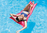 Pink inflatable pool mat.