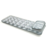 Silver inflatable pool mattress.
