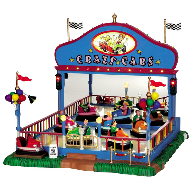 Village accent for a Lemax display. Designed to look like a bumper car carnival ride. There are multi-colored balloons and flags and people riding in the cars.