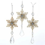 Snowflake ornaments with gems hanging underneath.