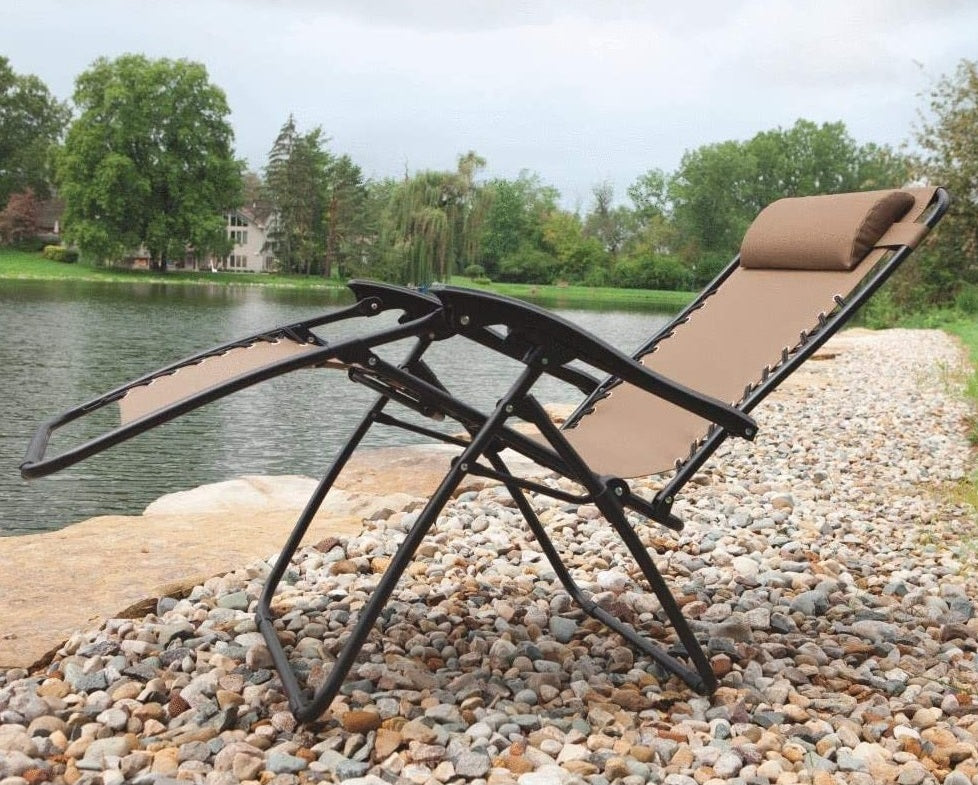 Tan folding chair.