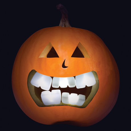 Pumpkin carving accessories. One package features light up fangs and the other package features light up buck teeth. You put them in your pumpkin's mouth to make them spooky or goofy looking.