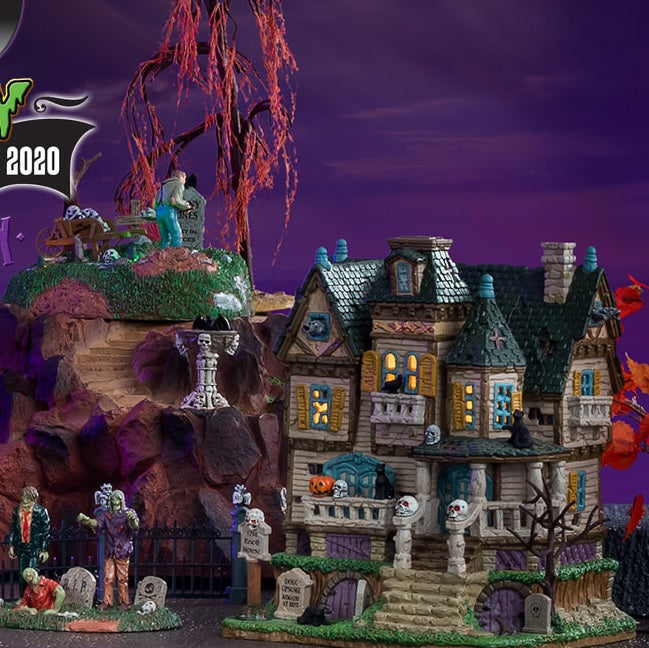Porcelain house for a Lemax display. Designed to look like a tall, old mansion accented with tombstones, skulls, crows, rats and trees with no leaves.
