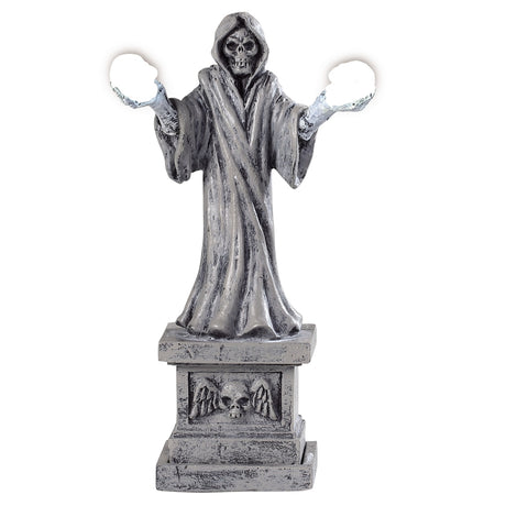 Plastic village accessory for a Lemax display. Designed to look like a Grim Reaper statue. The statue's hands are two lights.