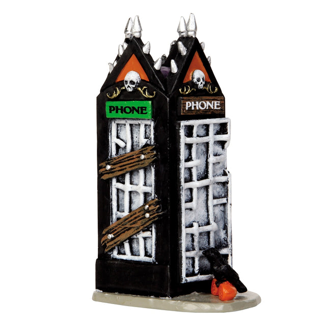 Polyresin figurine for a Lemax display. Designed to look like a spooky, black phonebooth. There are spikes on the top and skull accents. Some of the windows are boarded up. In front of the booth, there's a crow standing on a pumpkin.