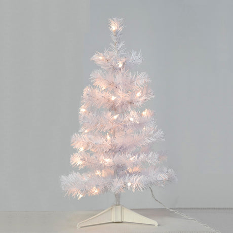 Small white tree pre-lit with clear lights.