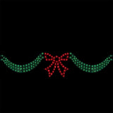 6 foot long lighted Christmas decoration designed to look like green ribbon with a red bow in the center. The background is black so you can see what it would look like at night.