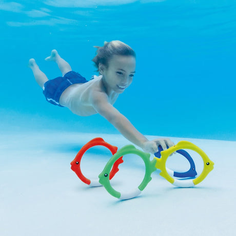 Set of diving toys that are shaped like circular fish.