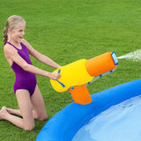 Massive inflatable backyard water park for kids. There's a small water slide that lands into a small pool and there's a fun wall to climb.