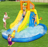 Massive inflatable backyard water park for kids. There's a small water slide that lands into a small pool and there's a fun wall to climb.