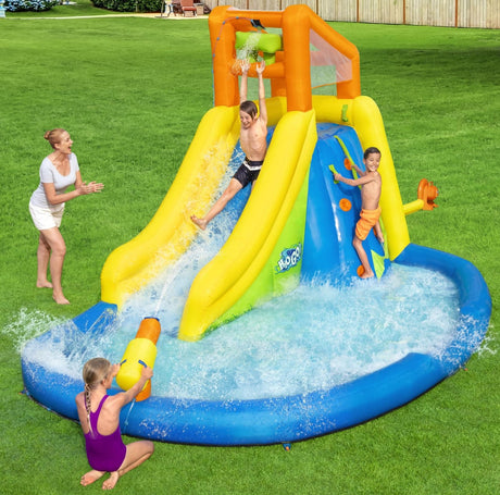 Massive inflatable backyard water park for kids. There's a small water slide that lands into a small pool and there's a fun wall to climb.