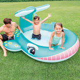 Inflatable pool for kids shaped like a cute, blue whale.