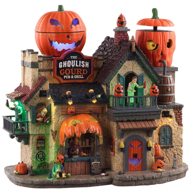 Polyresin lighted building for a Lemax Spooky Town display. The building looks like a rustic house. There are two animated jack-o-lanterns on the roof. There are lots of jack-o-lantern accents everywhere. The sign near the roof reads "THE GHOULISH GOURD PUB & GRILL." There are people on the balconies holding bottles. There's a person behind the counter.