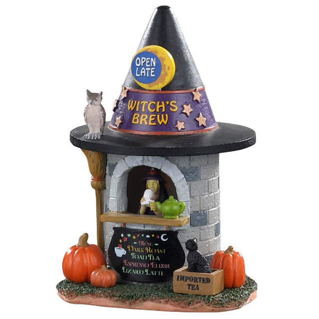 Small polyresin building for a Lemax Spooky Town display. Designed to look like a circular stone building with a witch hat for a roof. The sign on the roof is shaped like a yellow, crescent moon and reads "OPEN LATE." The ribbon around the witch hat is purple with orange stars and orange text that reads "WITCH'S BREW." There's a gray owl perched on the rim of the hat-roof. There's a broom upstairs the building, along with three orange pumpkins and a black cat in a box. There's a witch behind the counter.